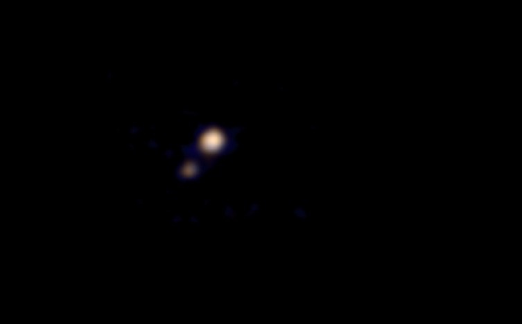 1st Color Image of Pluto Snapped by Approaching NASA Probe (Photo)